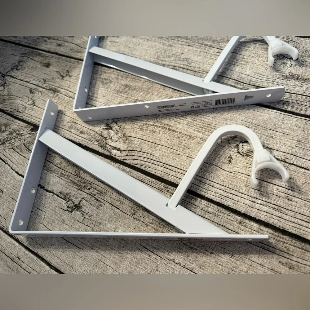 NWT. Never used set of 2 metal brackets. Great to support closet rods or shelves